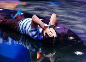 Daniel Negreanu falls to the floor after getting eliminated from the 2015 WSOP Main Event. (Photo: PokerPhotoArchives.com/Joe Giron)
