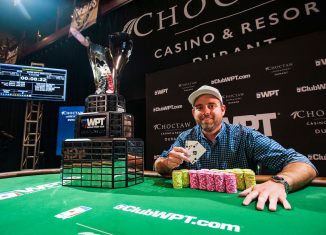 Brady Holiman holding up the winning hand after taking down WPT Choctaw earlier this season. (Photo: Pokerphotoarchive.com/Joe Giron)